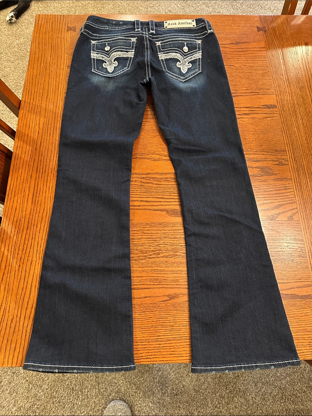 Women’s rock revival, easy boot jeans size 28 inseam measures about 32”